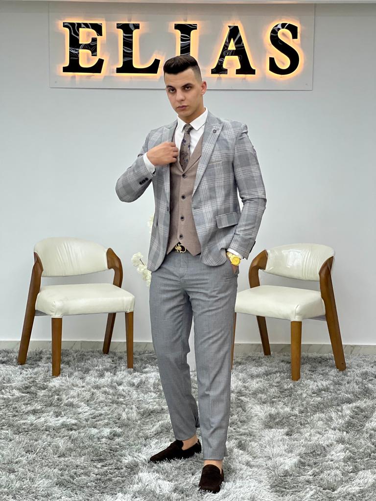 Turkish mix suit  \-Slim fit two-piece suit (blazer - pants, etc...)  \-Turkish button with gray coating, with a sparkling handkerchief  \-Pants that fit with your fit